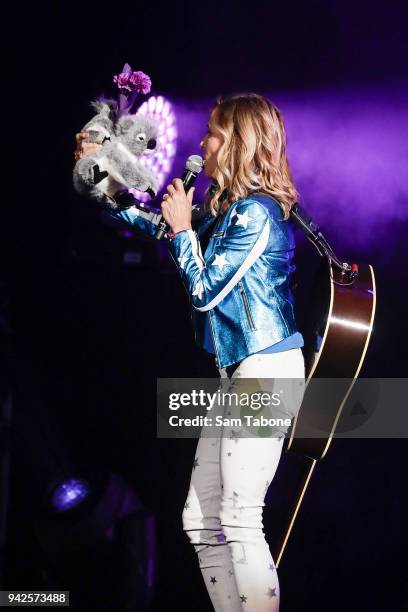 Sheryl Crow performs with a stuffed koala bear at Margaret Court Arena on April 6, 2018 in Melbourne, Australia.