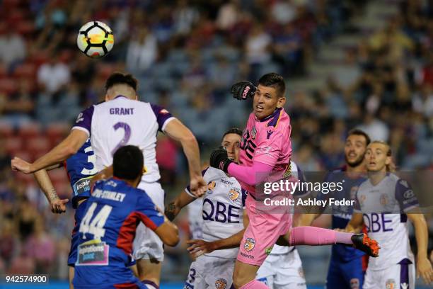 Liam Reddy of Perth Glory makes a save during the round 26 A-League match between the Newcastle jets and the Perth Glory at McDonald Jones Stadium on...