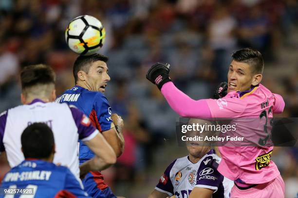 Liam Reddy of Perth Glory makes a save during the round 26 A-League match between the Newcastle jets and the Perth Glory at McDonald Jones Stadium on...