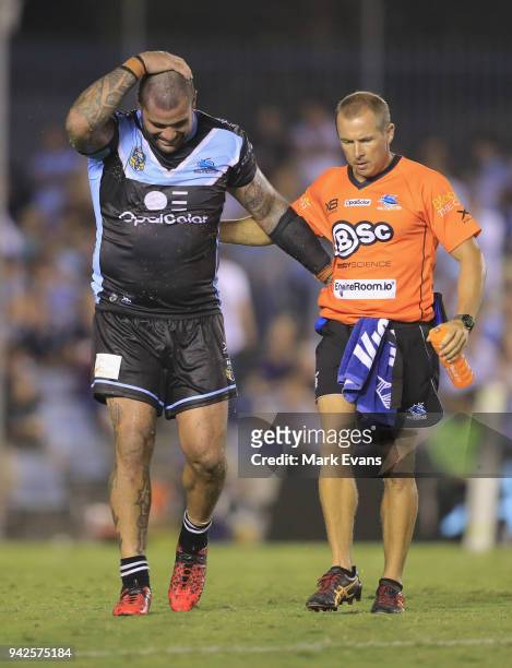 Andrew Fifita of the Sharks goes off the field after a knock to the head during the round five NRL match between the Cronulla Sharks and the Sydney...