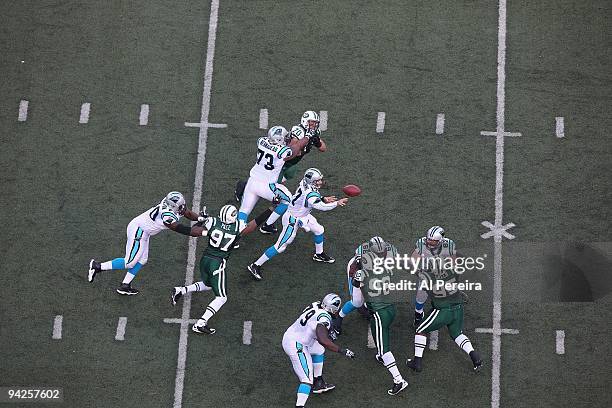 Elevated view as Quarterback Jake Delhomme of the Carolina Panthers passes the ball against the New York Jets at Giants Stadium on November 29, 2009...