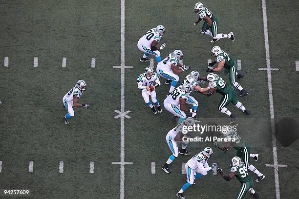 Elevated view as Quarterback Jake Delhomme of the Carolina Panthers drops to pass the ball against the New York Jets at Giants Stadium on November...