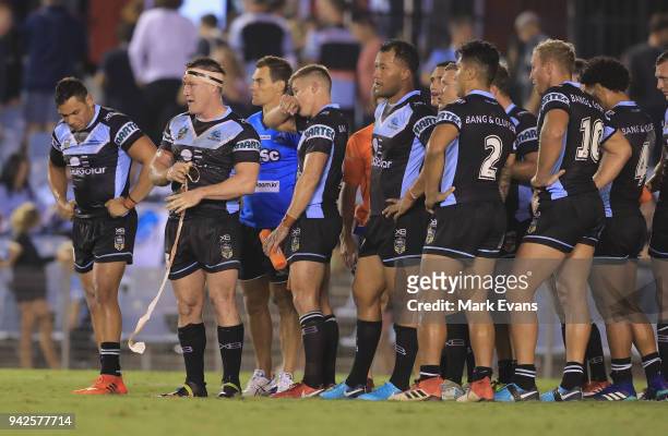 The Sharks dejected after a Roosters try during the round five NRL match between the Cronulla Sharks and the Sydney Roosters at Southern Cross Group...