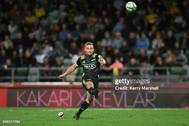 Ihaia West of the Hurricanes kicks a conversion during the round eight Super Rugby match between the Hurricanes and the Sharks at McLean Park on...