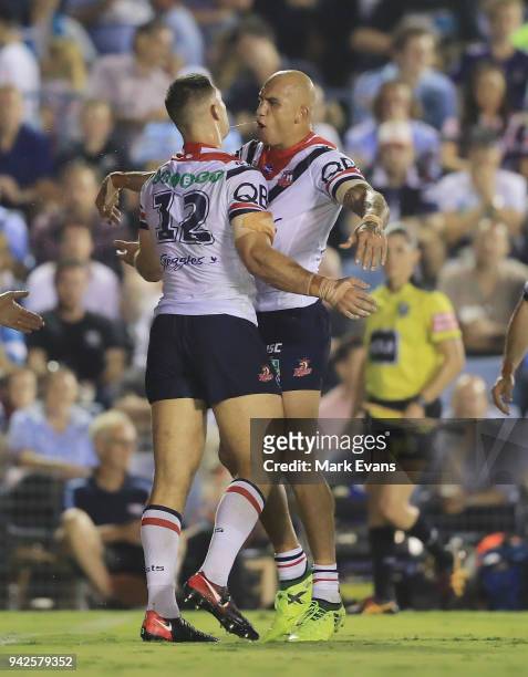 Ryan Matterson of the Roosterscelebrates his try with Blake Ferguson during the round five NRL match between the Cronulla Sharks and the Sydney...