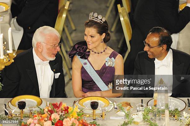 Crown Princess Victoria of Sweden talks to Thomas A. Steitz and Venkatraman Ramakrishnan, winners of the Nobel Prize in Chemistry during the Nobel...