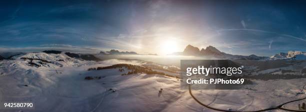 panoramic aerial view of seiser alm at sunrise - pjphoto69 stock pictures, royalty-free photos & images
