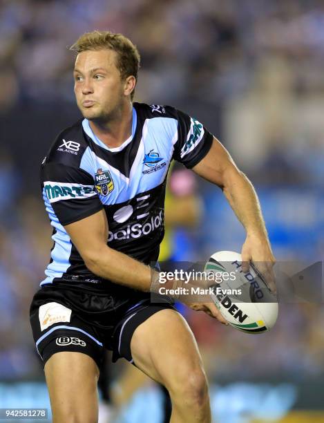 Matt Moylan of the Sharks looks to pass the ball during the round five NRL match between the Cronulla Sharks and the Sydney Roosters at Southern...