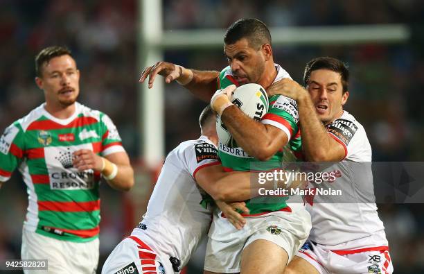 Greg Inglis of the Rabbitohs is tackled during the round five NRL match between the St George Illawarra Dragons and the South Sydney Rabbitohs at UOW...