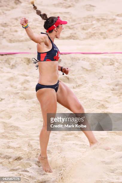 Victoria Palmer of England celebrates a point during the Beach Volleyball women preliminary Pool B match between Jessica Grimson and Victoria Palmer...