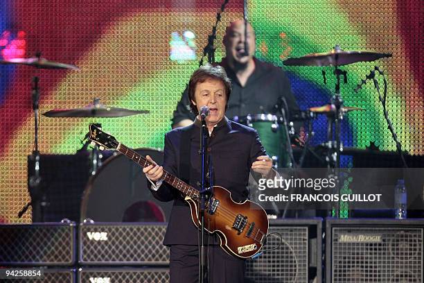 British pop star Paul McCartney performs on December 10, 2009 in Paris during a concert as part of his Good Evening Europe-tour, his first European...