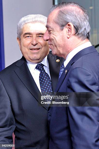 Demetris Christofias, president of Cyprus, left and Lawrence Gonzi, prime minister of Malta, speak during the European Union leaders summit at the EU...