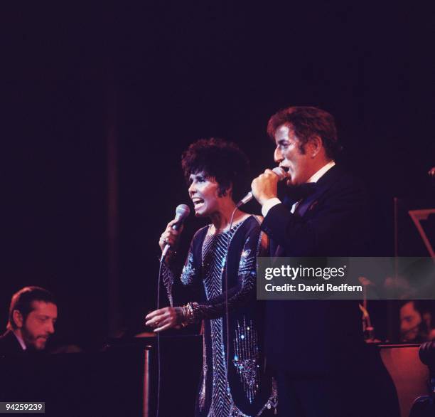 American singers Lena Horne and Tony Bennett perform on stage circa 1973.