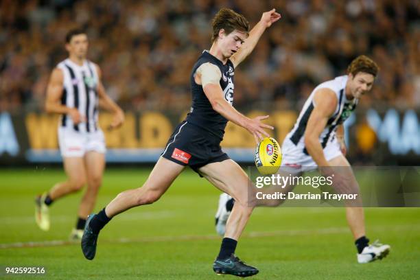 Paddy Dow of the Blues kicks the ball during the round three AFL match between the Carlton Blues and the Collingwood Magpies at Melbourne Cricket...