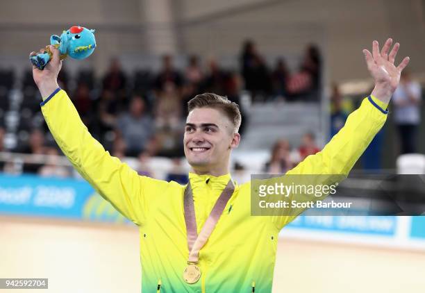 Gold medalist Matt Glaetzer of Australia celebrates during the medal ceremony for the Men's Keirin Finals on day two of the Gold Coast 2018...
