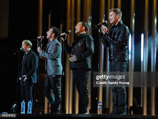Kian Egan, Mark Feehily, Shane Filan and Nicky Byrne of Westlife perform during the Nobel Peace Prize Concert Rehearsals at Oslo Spektrum on December...