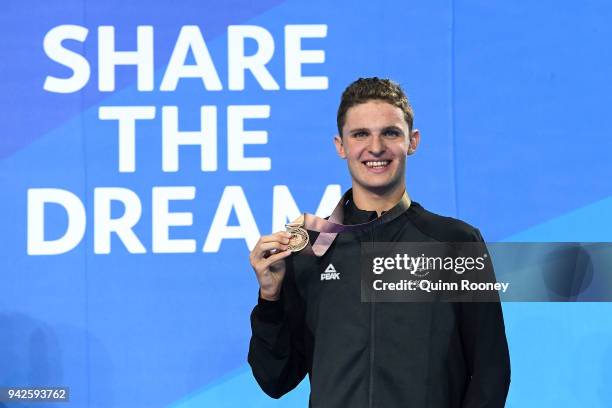 Bronze medalist Lewis Clareburt of New Zealand poses during the medal ceremony for the Men's 400m Individual Medley Final on day two of the Gold...