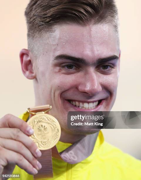 Gold medalist Matt Glaetzer of Australia celebrates during the medal ceremony for the Men's Keirin Finals on day two of the Gold Coast 2018...