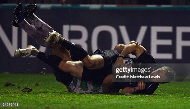 Alex Tait of Newcastle scores a try during the Amlin Challenge Cup match between Newcastle Falcons and Montauban at Kingston Park on December 10,...