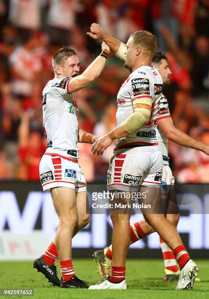 Matthew Dufty and Jack de Belin of the Dragons celebrate after winning the round five NRL match between the St George Illawarra Dragons and the South...