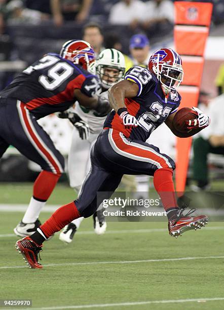 Running back Marshawn Lynch of the Buffalo Bills runs with the ball for yardage during their NFL game against the New York Jets on December 3, 2009...