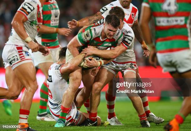Angus Crichton of the Rabbitohs is tackled during the round five NRL match between the St George Illawarra Dragons and the South Sydney Rabbitohs at...
