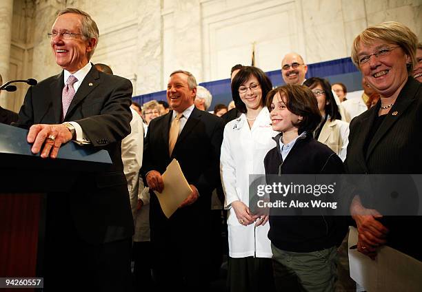 Senate Majority Leader Sen. Harry Reid laughs with Senate Majority Whip Sen. Richard Durbin , Sen. Patty Murray and an independent group of doctors...