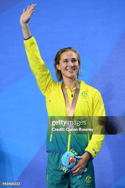 Silver medalist Madeline Groves of Australia poses during the medal ceremony for the Women's 100m Butterfly Final on day two of the Gold Coast 2018...