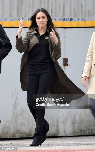 Meghan Markle attends the UK Team Trials for the Invictus Games Sydney 2018 alongside Prince Harry at the University of Bath Sports Training Village...