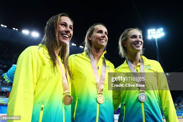 Silver medalist Madeline Groves of Australia , gold medalist Emma McKeon of Australia and bronze medalist Brianna Throssell of Australia pose during...