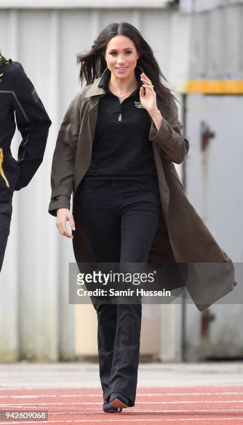 Meghan Markle attends the UK Team Trials for the Invictus Games Sydney 2018 alongside Prince Harry at the University of Bath Sports Training Village...