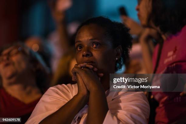Woman weeps as supporters of former President Luiz Inacio Lula da Silva gather in front of the headquarters of the Metalworkers' Union while awaiting...