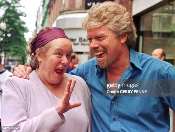 File picture of late Northern Ireland Secretary of State Mo Mowlam and British entrepreneur Richard Branson enjoying their walk 20 May 1998 through...
