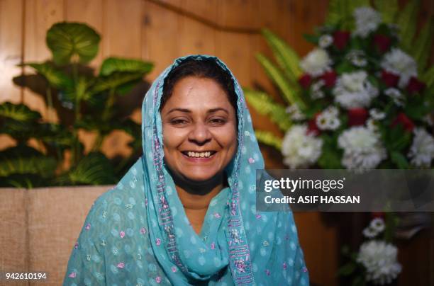 Pakistani former prisoner Asma Nawab poses for a photograph at her lawyer's house after her release in Karachi on April 6, 2018. A Pakistani woman...