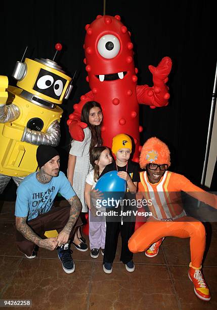 Musician Travis Barker and kids pose with Yo Gabba Gabba! characters during the Yo Gabba Gabba! : "There's A Party In My City" Live at The Shrine...