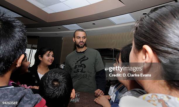 Tony Parker of the San Antonio answers questions from the 5th grade students from Goodwin Frazier Elementary School that won the Tony Parker Around...