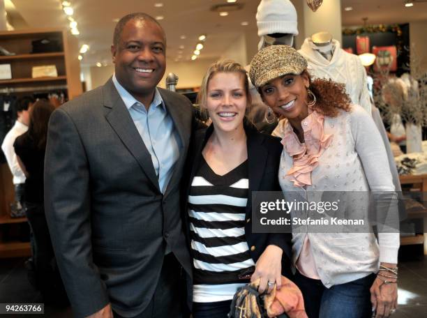 Rodney Peete and actresses Busy Philipps and Holly Robinson Peete attend the HollyRod Foundation and J.Crew private shopping event at The Grove on...