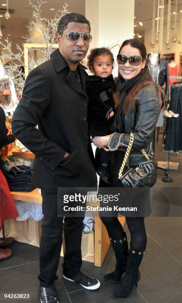 Kenneth "Babyface" Edmonds, Peyton Edmonds and Nicole Pantenburg attend the HollyRod Foundation and J.Crew private shopping event at The Grove on...