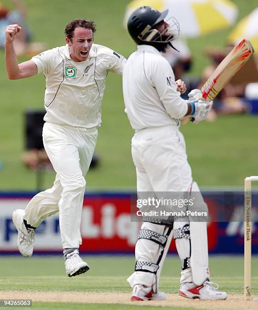 Iain O'Brien of New Zealand celebrates the wicket of Mohammad Yousf of Pakistan during day one of the Third Test match between New Zealand and...
