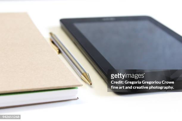 technology - notepad, pen, tablet - gregoria gregoriou crowe fine art and creative photography stock pictures, royalty-free photos & images