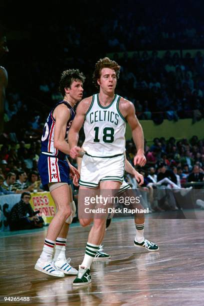 Dave Cowens of the Boston Celtics runs upcourt against the Philadelphia 76ers during a game played in 1977 at the Boston Garden in Boston,...