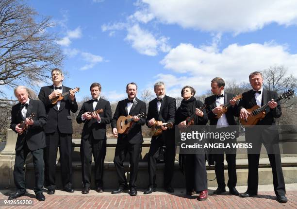 The Ukulele Orchestra of Great Britain plays in Central Park on April 5, 2018 in New York City. The ukulele has two obvious selling points: it is...