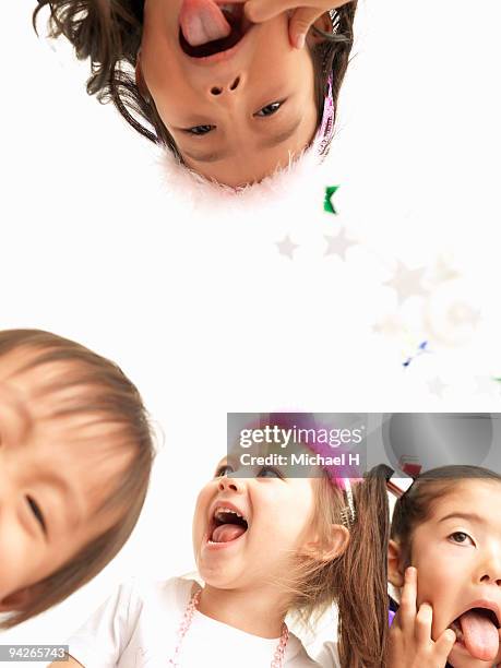 close-up of smile of children in party - smile close up stock-fotos und bilder