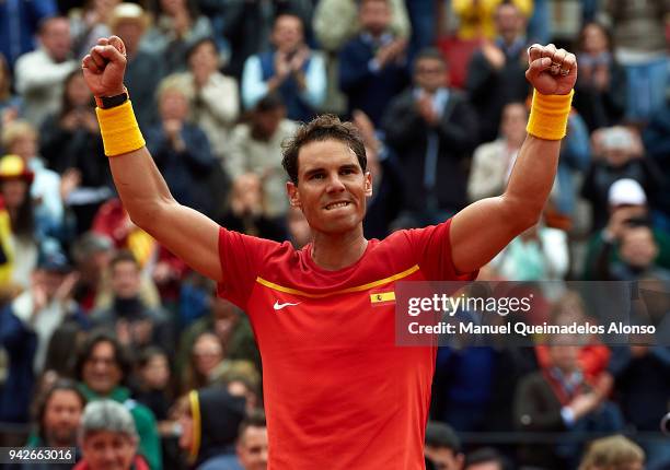 Rafael Nadal of Spain celebrates after defeating Philipp Kohlschreiber of Germany during day one of the Davis Cup World Group Quarter Final match...