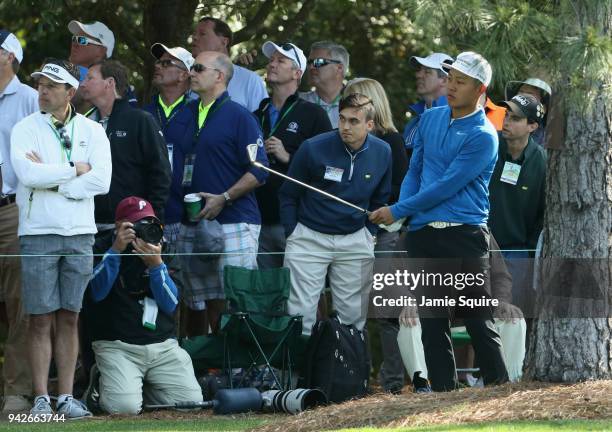 Amateur Yuxin Lin of China plays his second shot on the first hole during the second round of the 2018 Masters Tournament at Augusta National Golf...