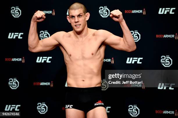 Joe Lauzon poses on the scale during the UFC 223 official weigh-ins on April 6, 2018 in Brooklyn, New York.