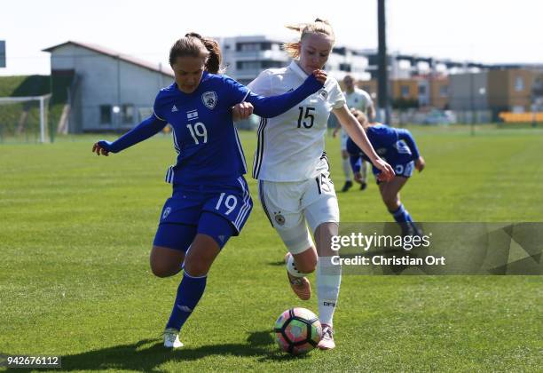 Elias Blokhin of Israel challenges Meret Wittje of Germany for the ball during the UEFA Women's Under19 Elite Round match between Women's U19 Germany...