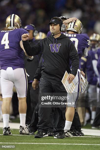 Head coach Steve Sarkisian of the Washington Huskies motions from the sidelines during the game against the California Bears on December 5, 2009 at...