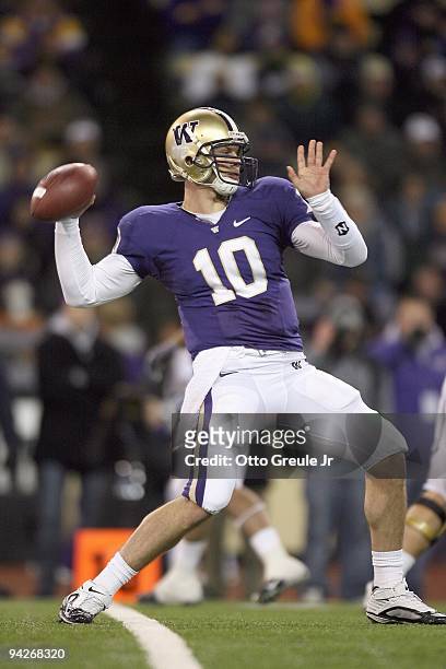 Quarterback Jake Locker of the Washington Huskies looks to pass the ball during game against the California Bears on December 5, 2009 at Husky...