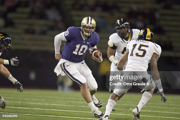 Quarterback Jake Locker of the Washington Huskies runs the ball during game against the California Bears on December 5, 2009 at Husky Stadium in...